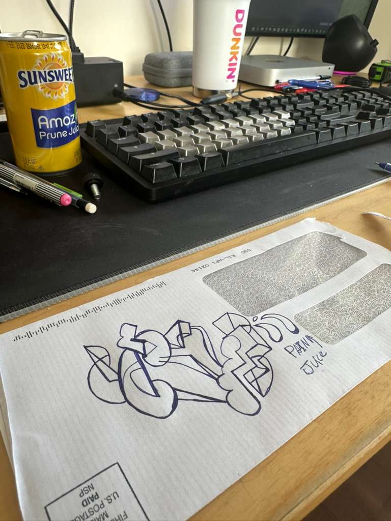 Coffee mug and prune juice beside the Third Juice doodle